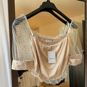 Ambition - polka dot cropped top with cuff sleeve